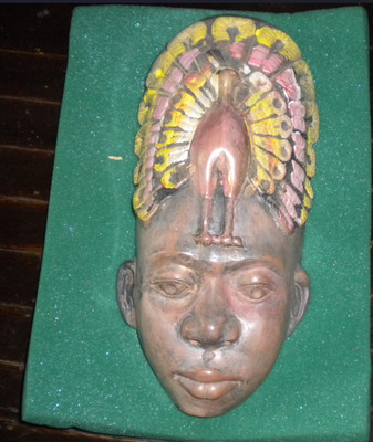 Painted sculpture of a face